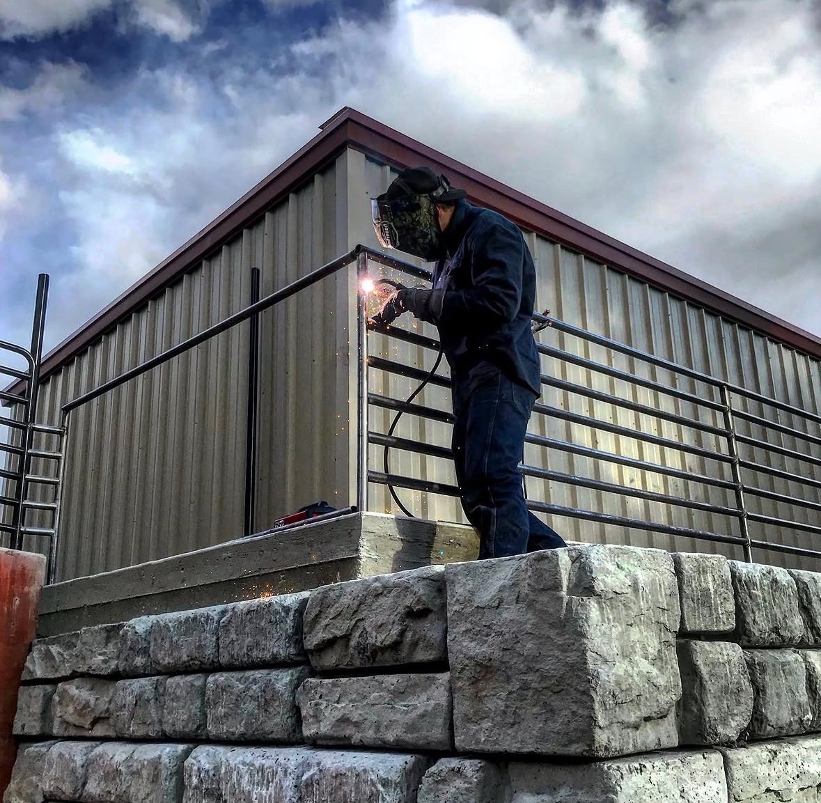 On-Site Railing Weld Above Block Wall